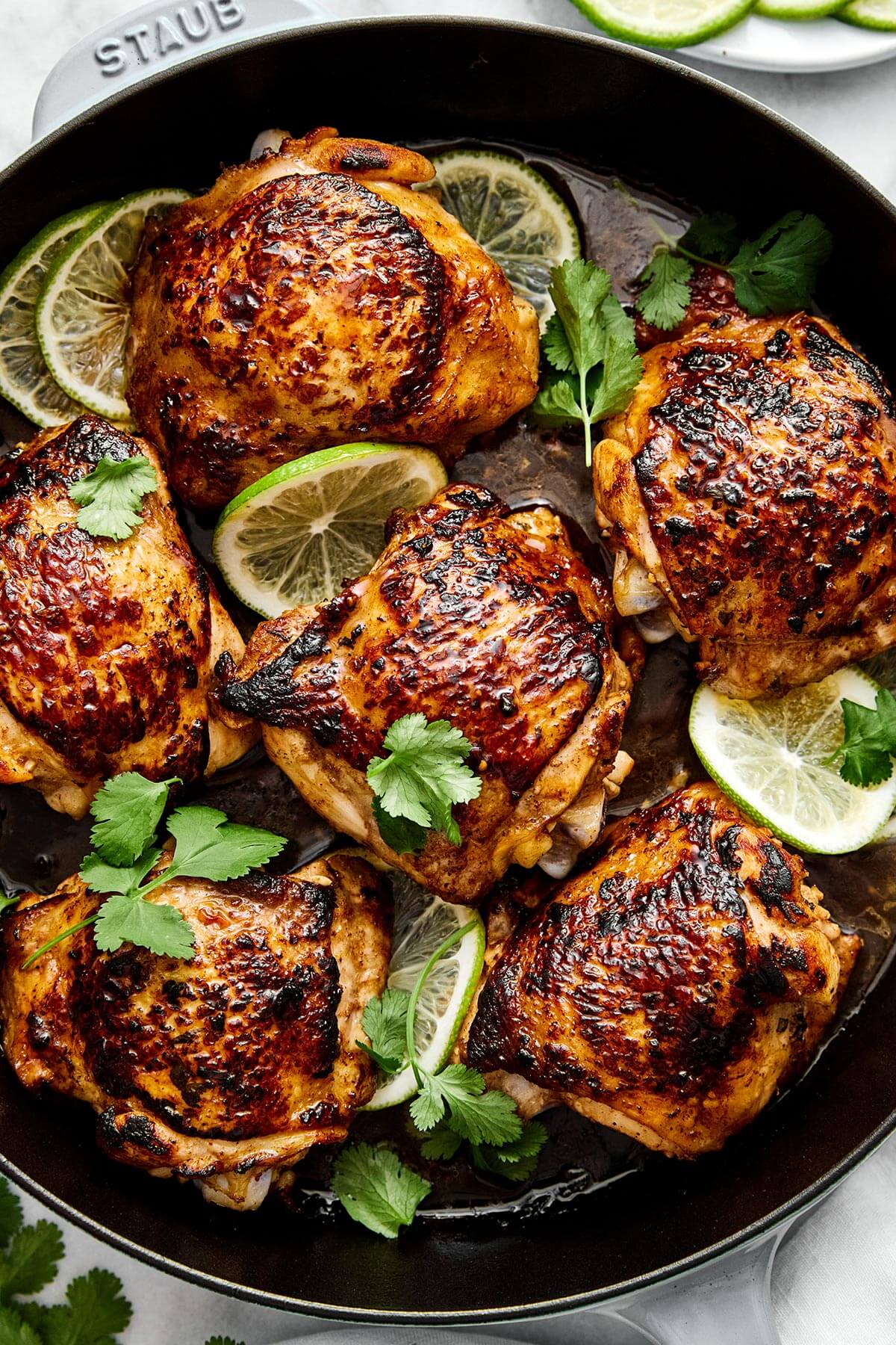 A skillet of cilantro lime chicken thighs.