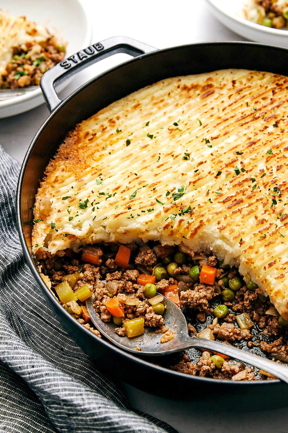 Cottage pie with a spoon.