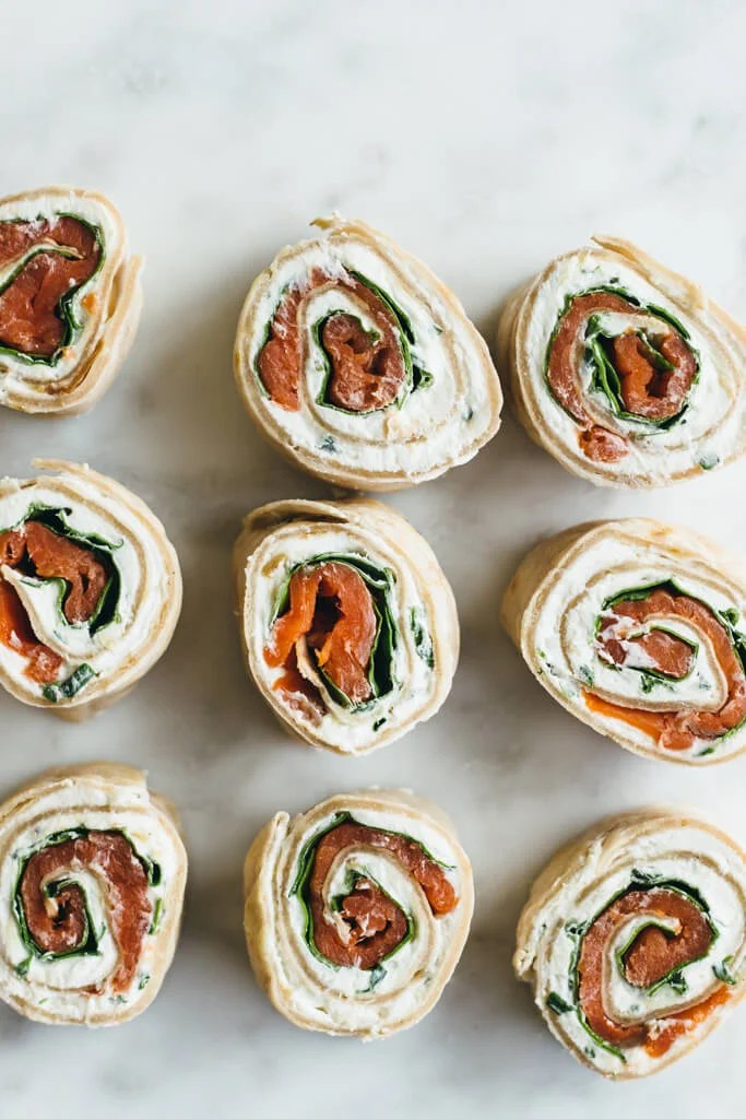 (gluten-free, paleo) Herbed Chevre, Spinach and Smoked Salmon Pinwheel. A tasty appetizer or snack made with cassava flour tortillas.