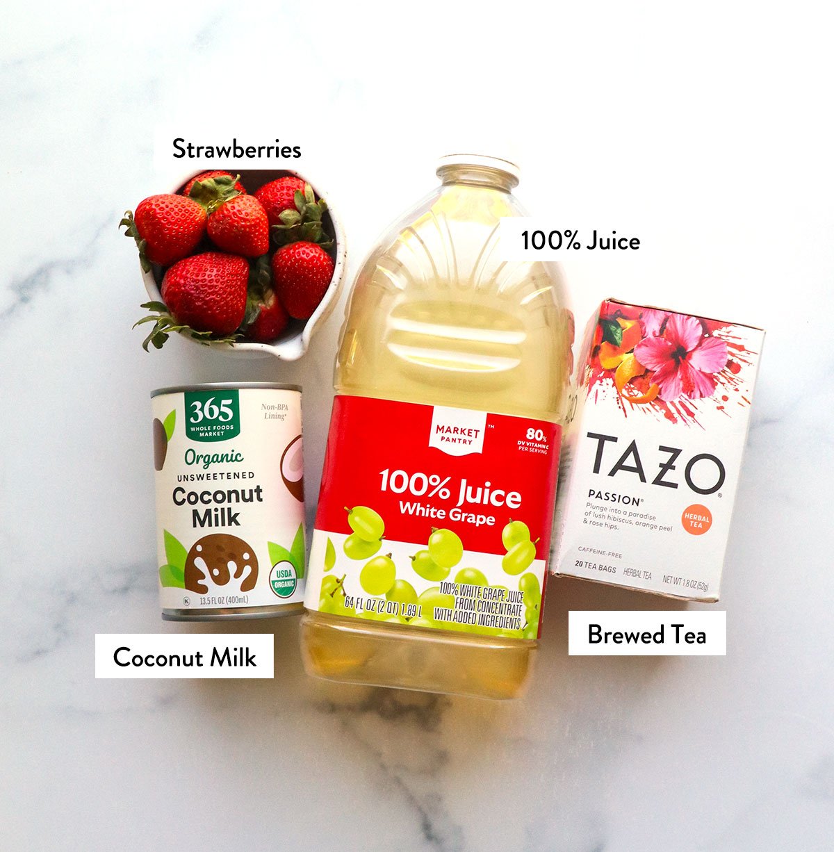 pink drink ingredients labeled including white grape juice, tazo tea, coconut milk and strawberries.