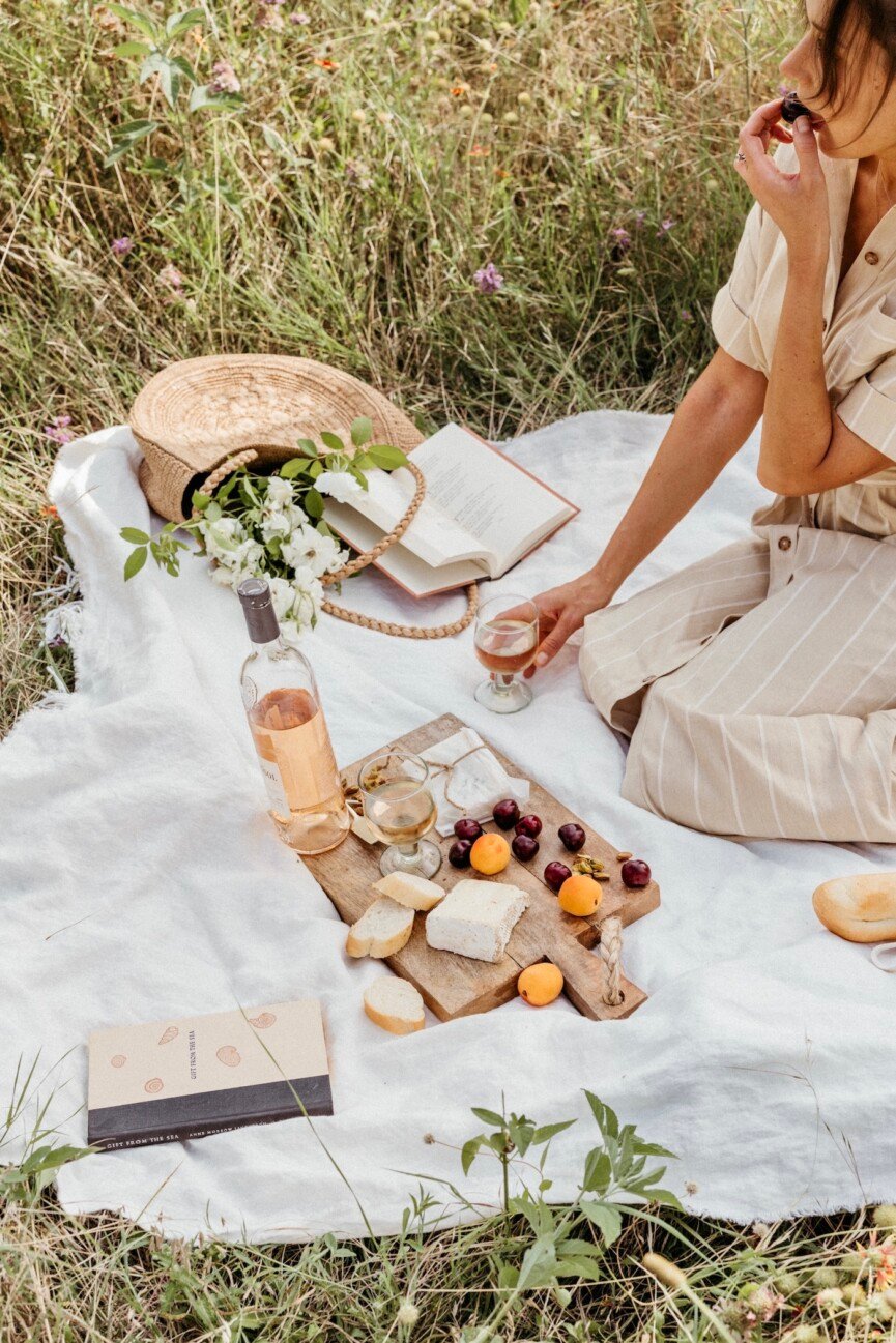 aesthetic picnic set up in wildflower field_summer solstice menu ideas