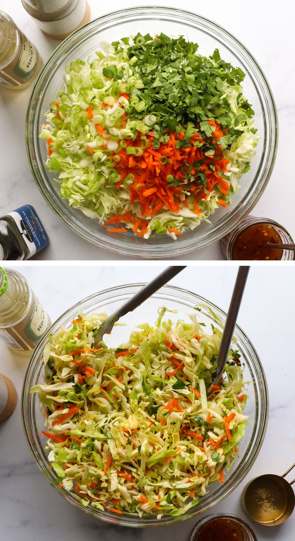 dressing added to asian coleslaw and tossed in glass bowl.