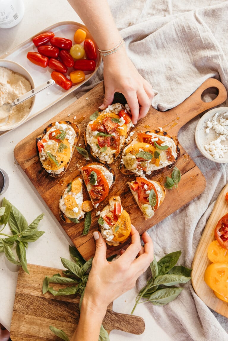 hummus toast with tomatoes, feta, and za'atar