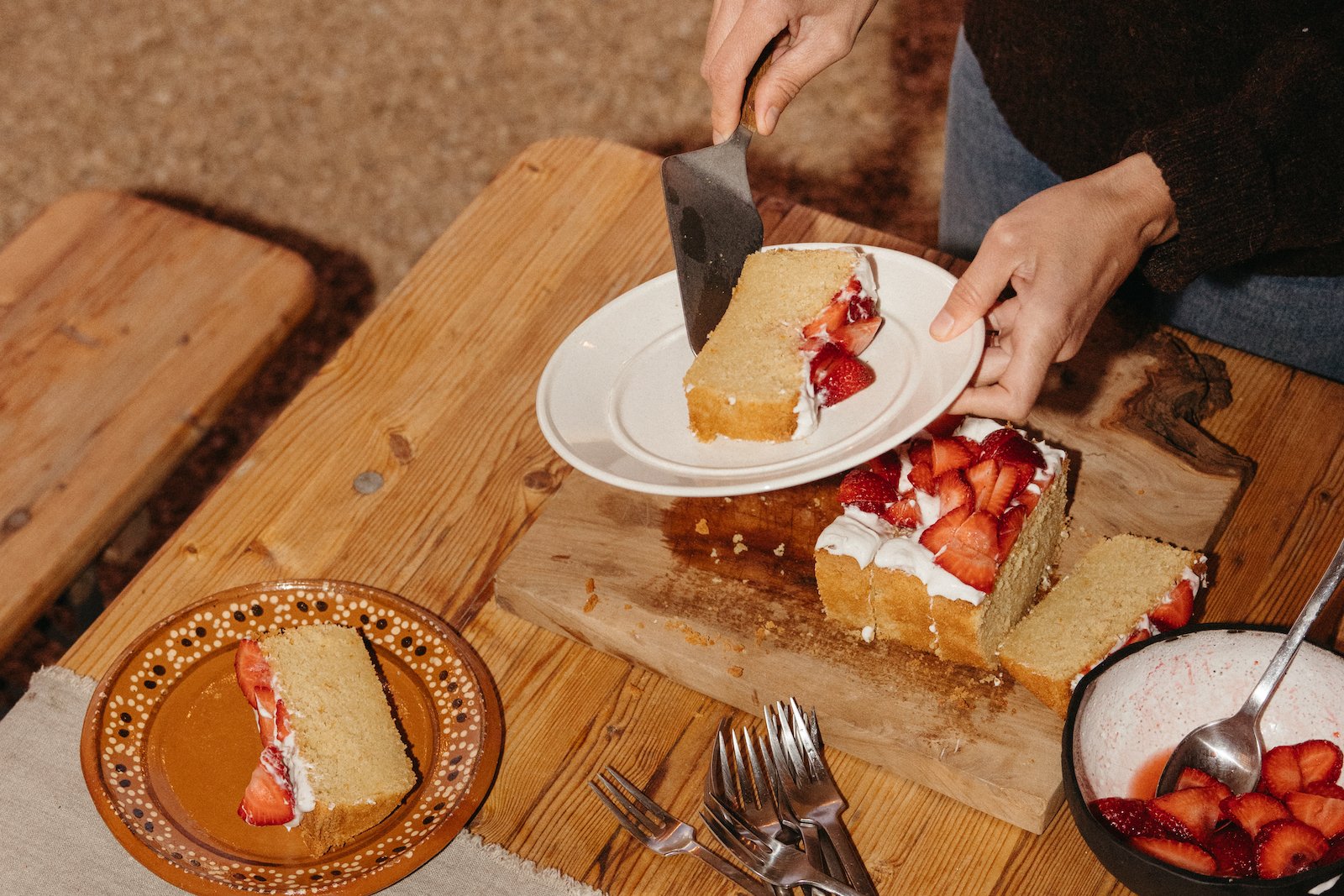 gluten-free citrus cake with strawberries and cardamom coconut cream