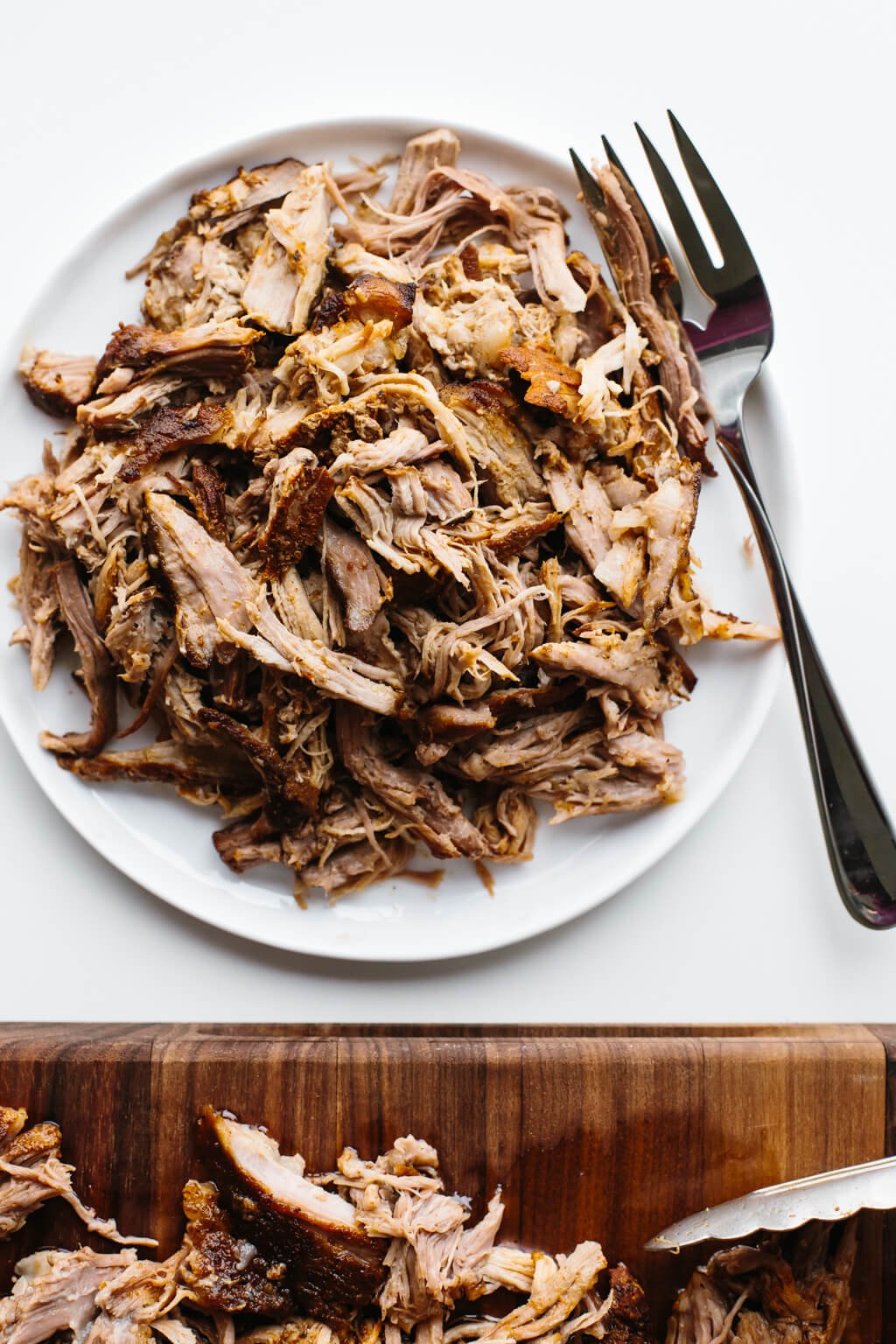 Slow cooker pulled pork is juicy, flavorful and delicious. The best slow cooker recipe!