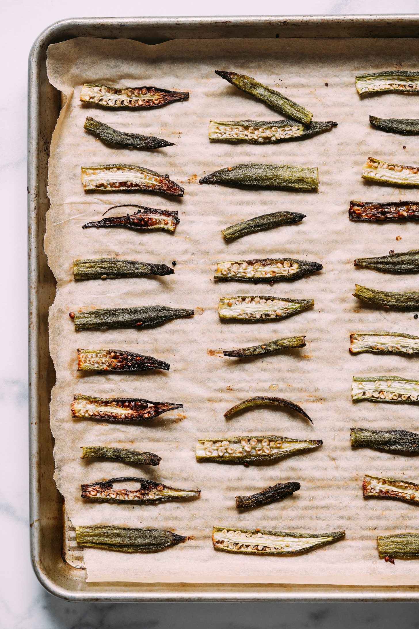 Baking sheet of perfectly crispy oven roasted okra
