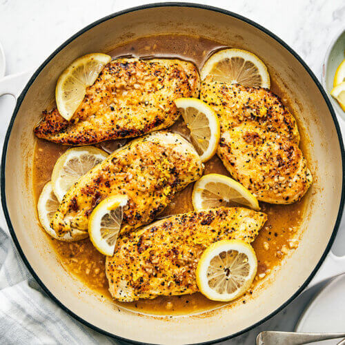 A pan with lemon pepper chicken.