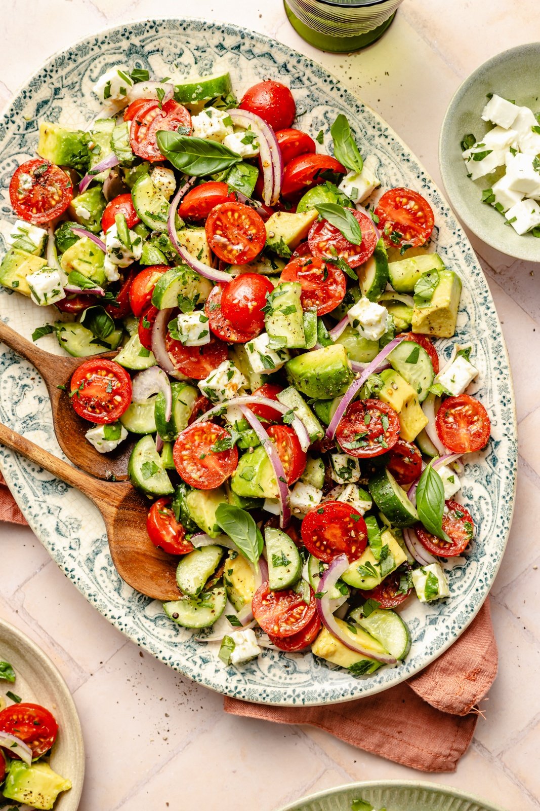 easy tomato cucumber salad with feta on a platter