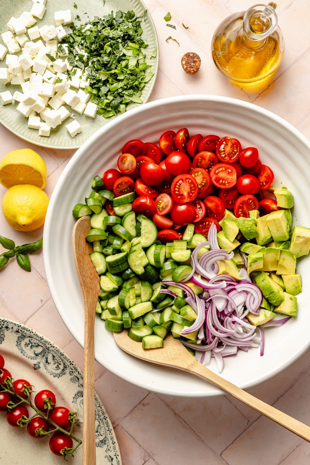 ingredients for an easy cucumber tomato salad in bowls