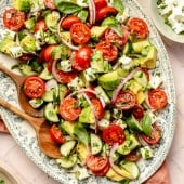 fresh tomato cucumber salad on a platter