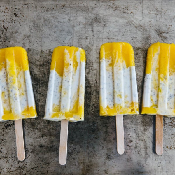 (dairy-free, vegan) Coconut chia mango popsicles. A creamy coconut mango popsicle with healthy chia seeds.