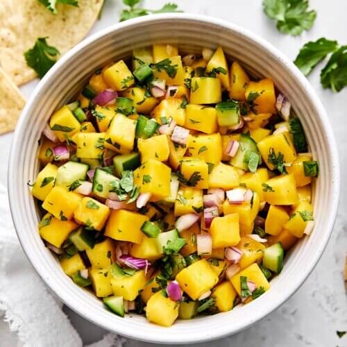 A bowl of fresh mango salsa.