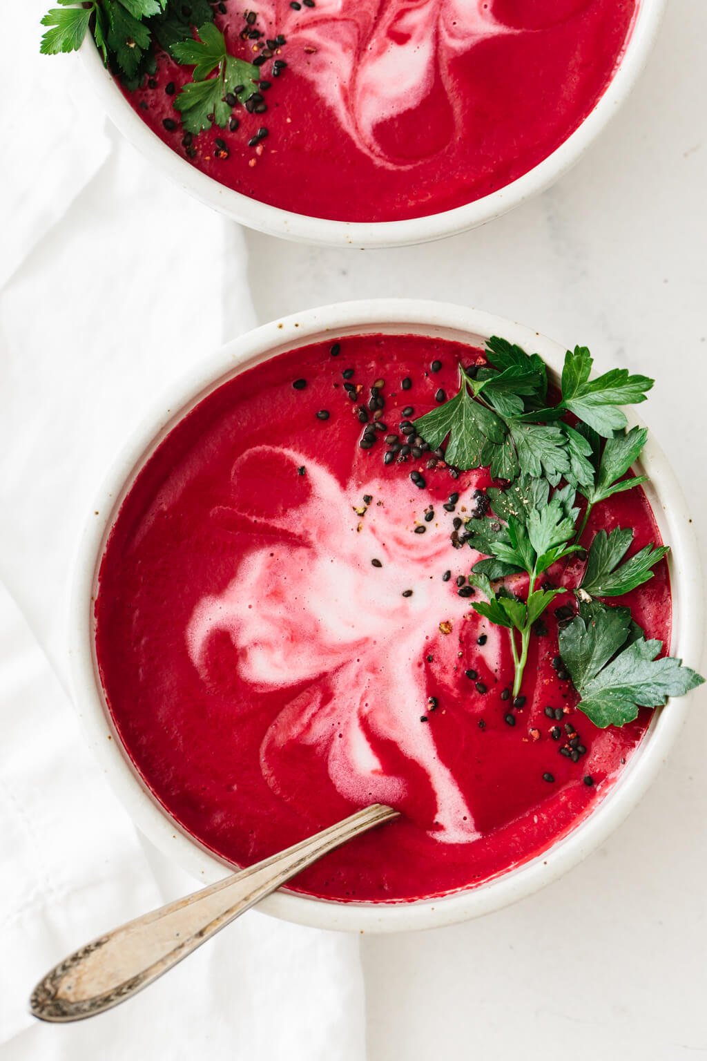Beet soup in bowls.
