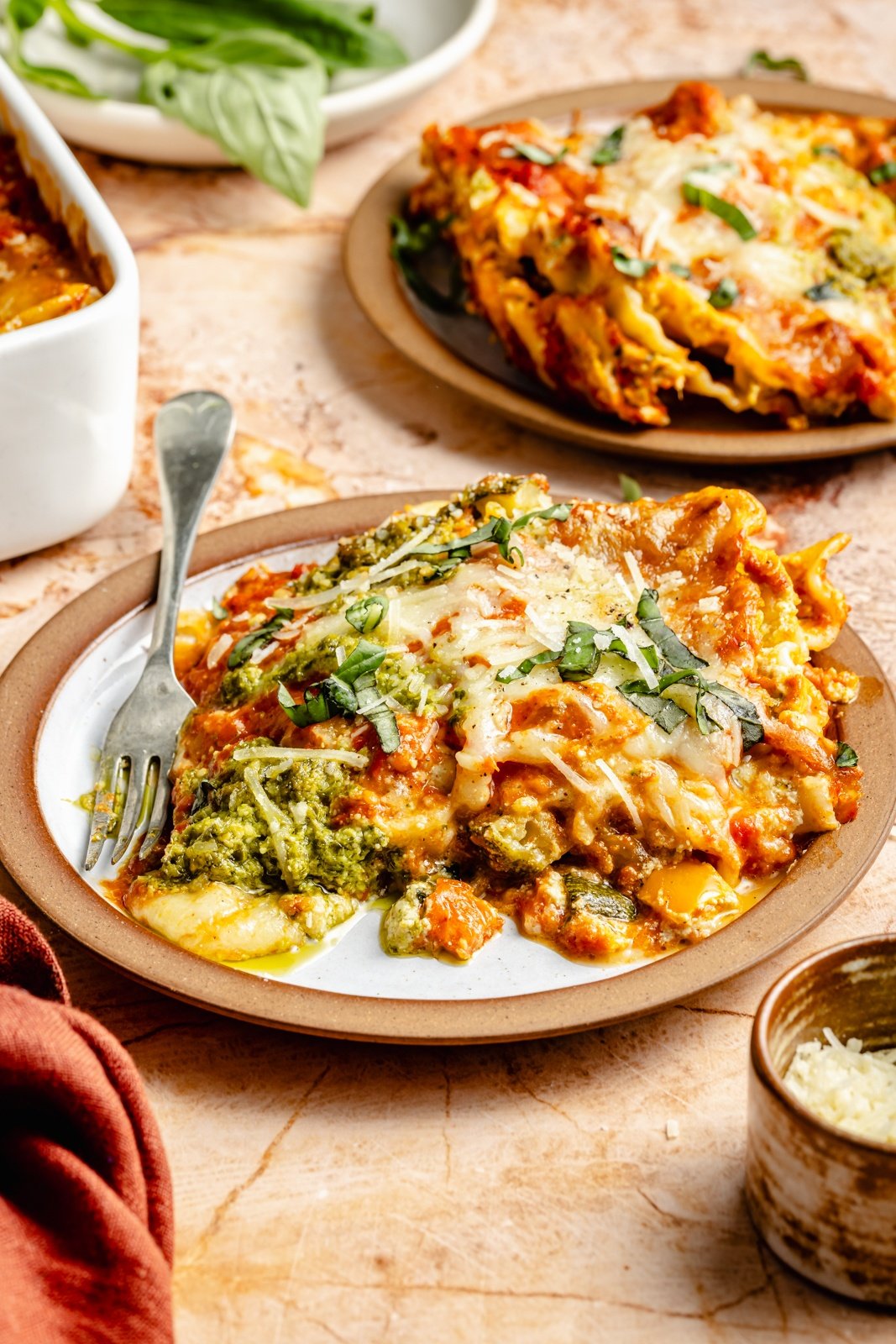 slice of tie dye vegetarian lasagna on a plate