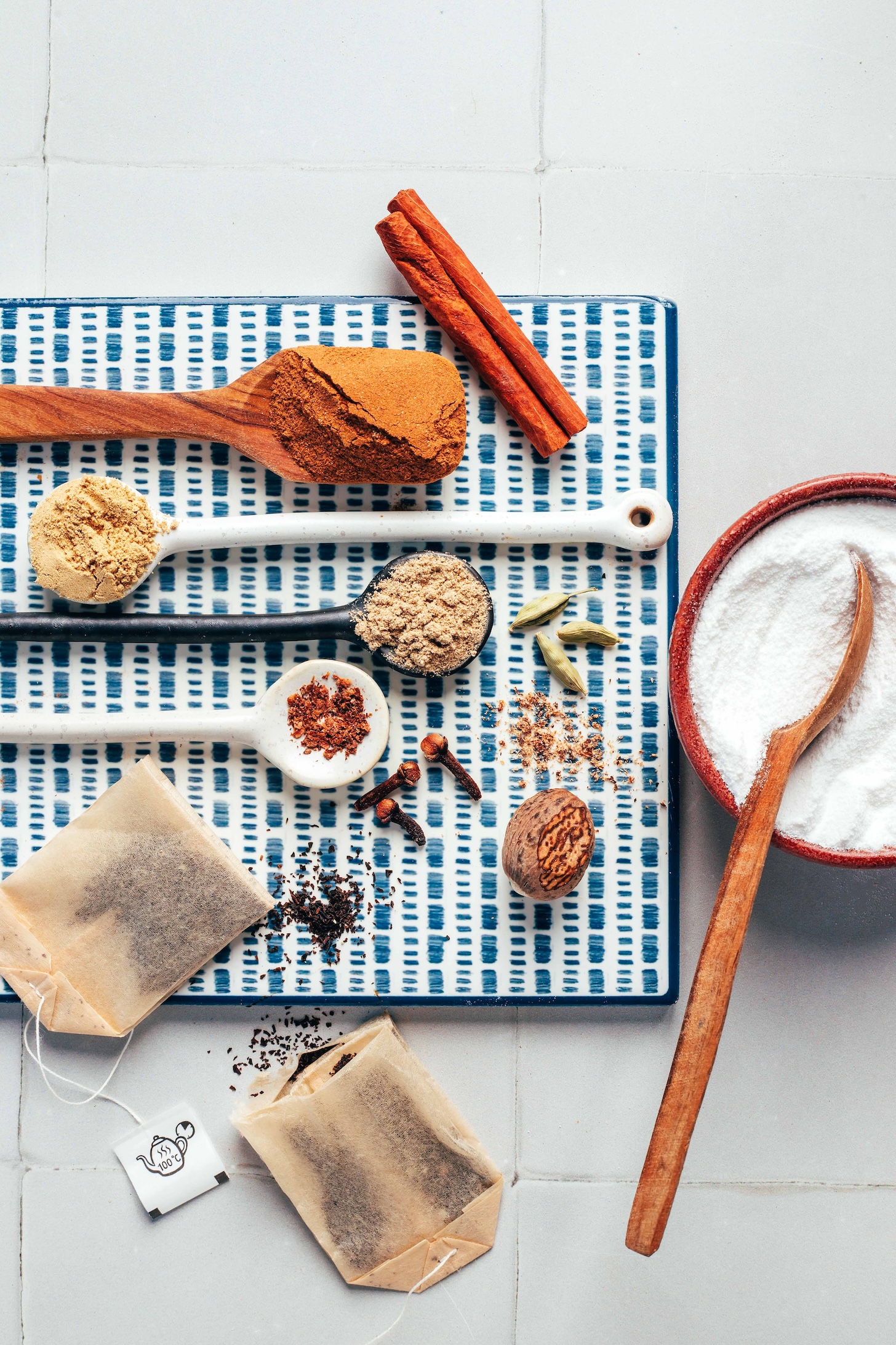 Coconut milk powder, black tea bags, nutmeg, cloves, cardamom, ginger, and cinnamon