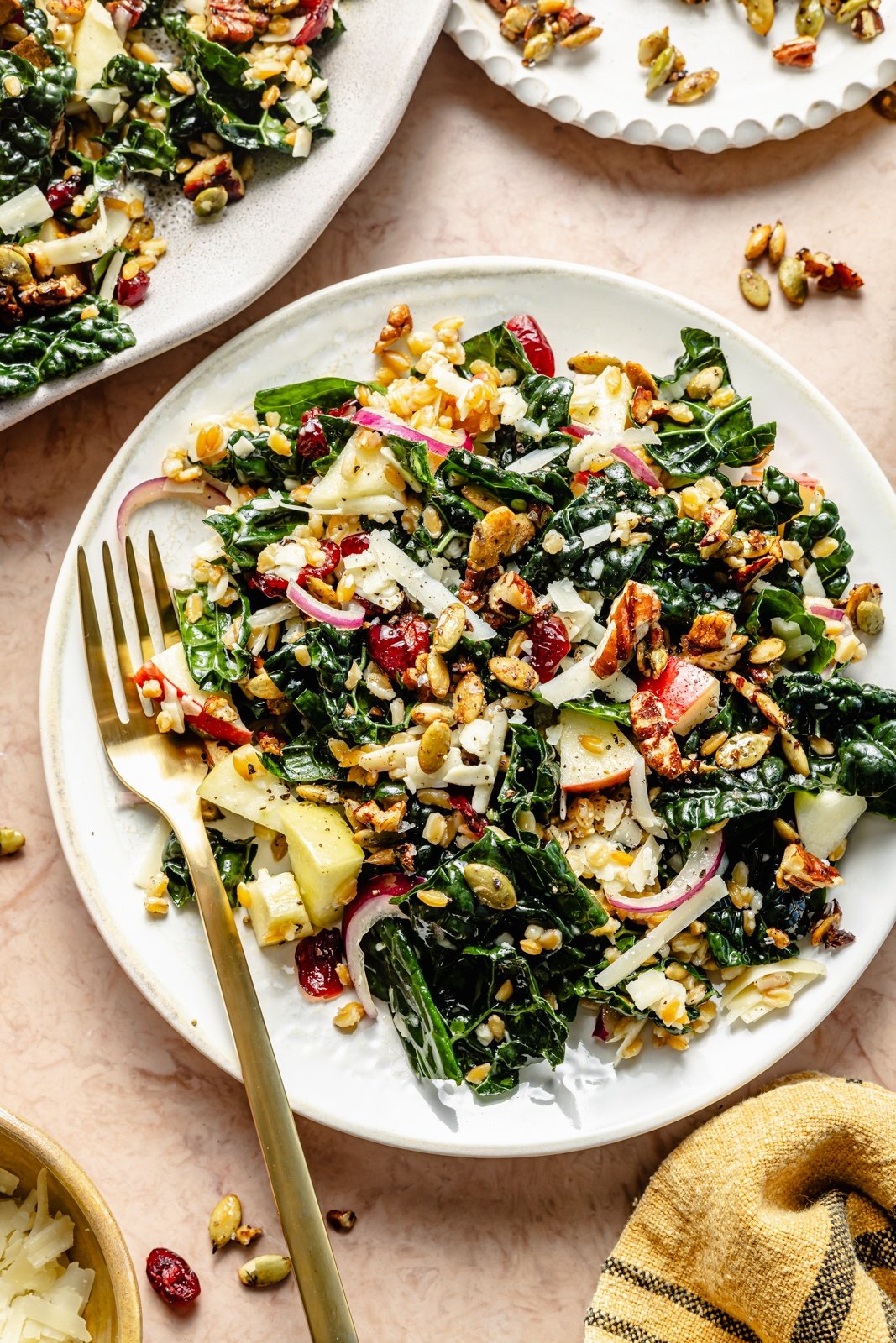 kale farro apple salad on a plate