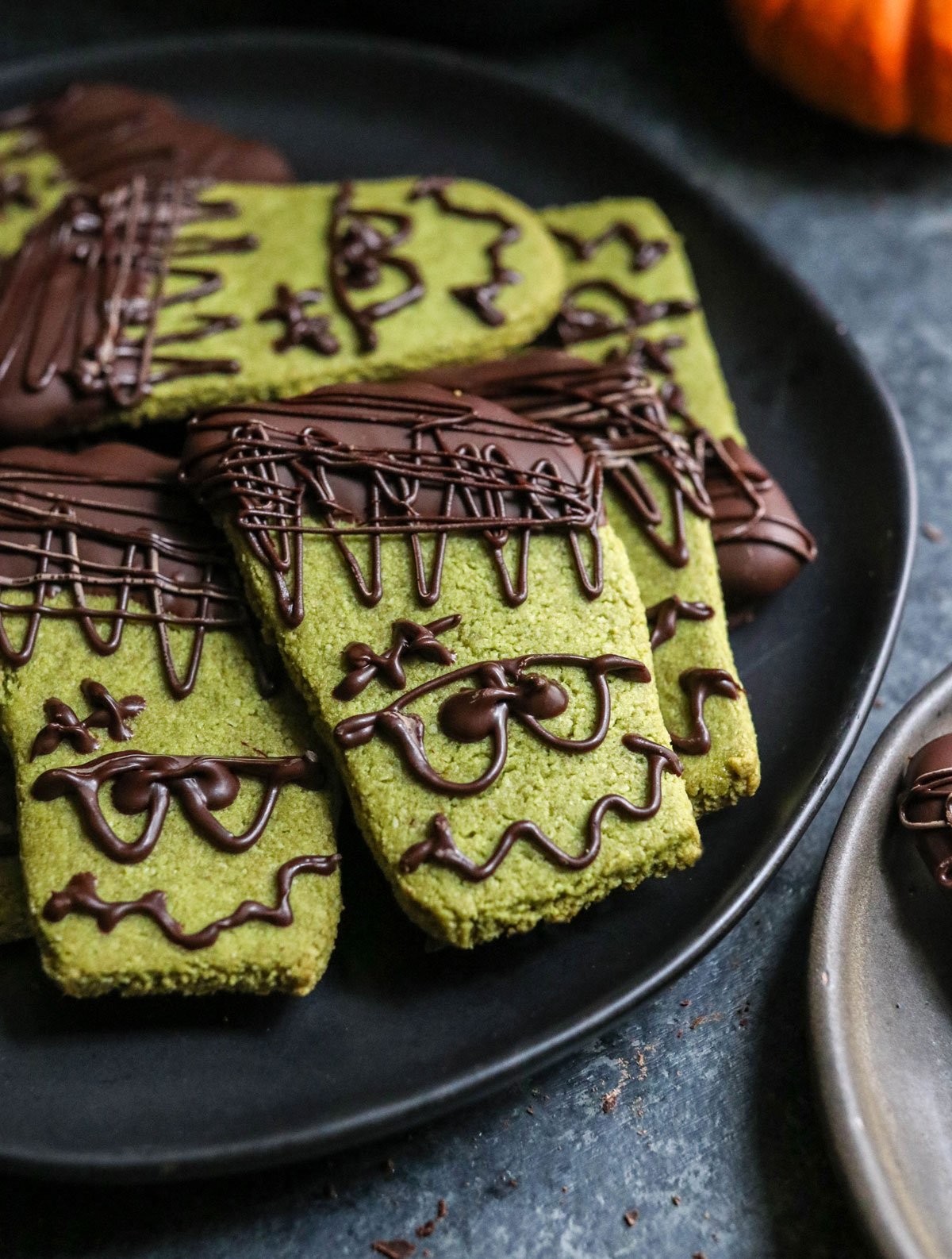 frankenstein cookies on black plate