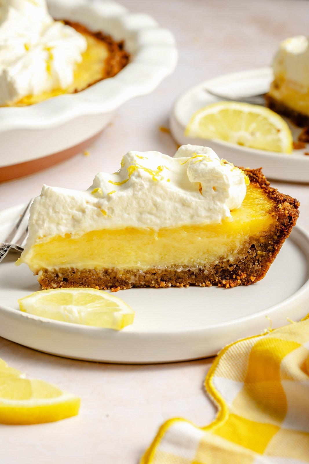 slice of lemon cream pie on a plate