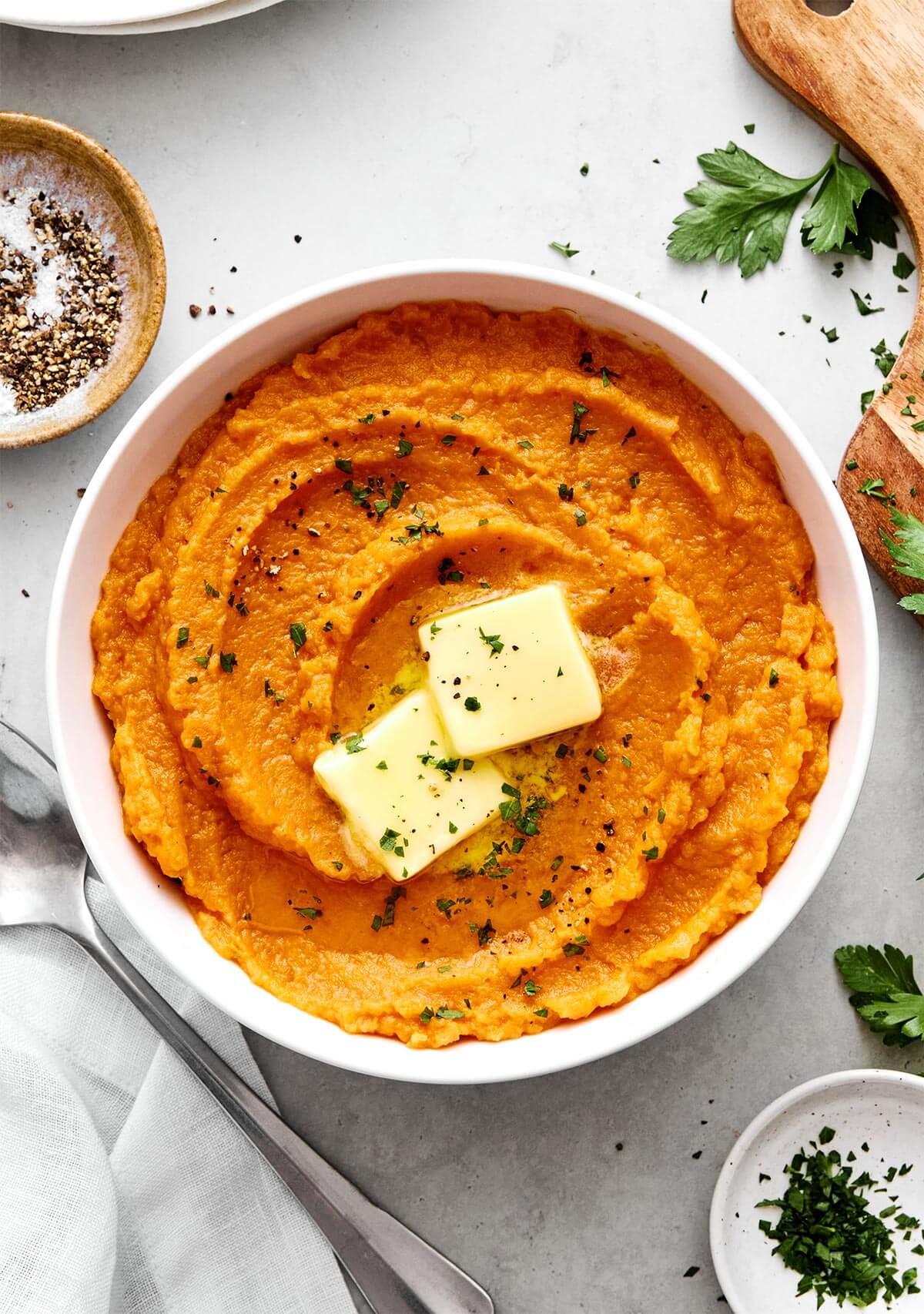 Mashed sweet potatoes in a bowl.