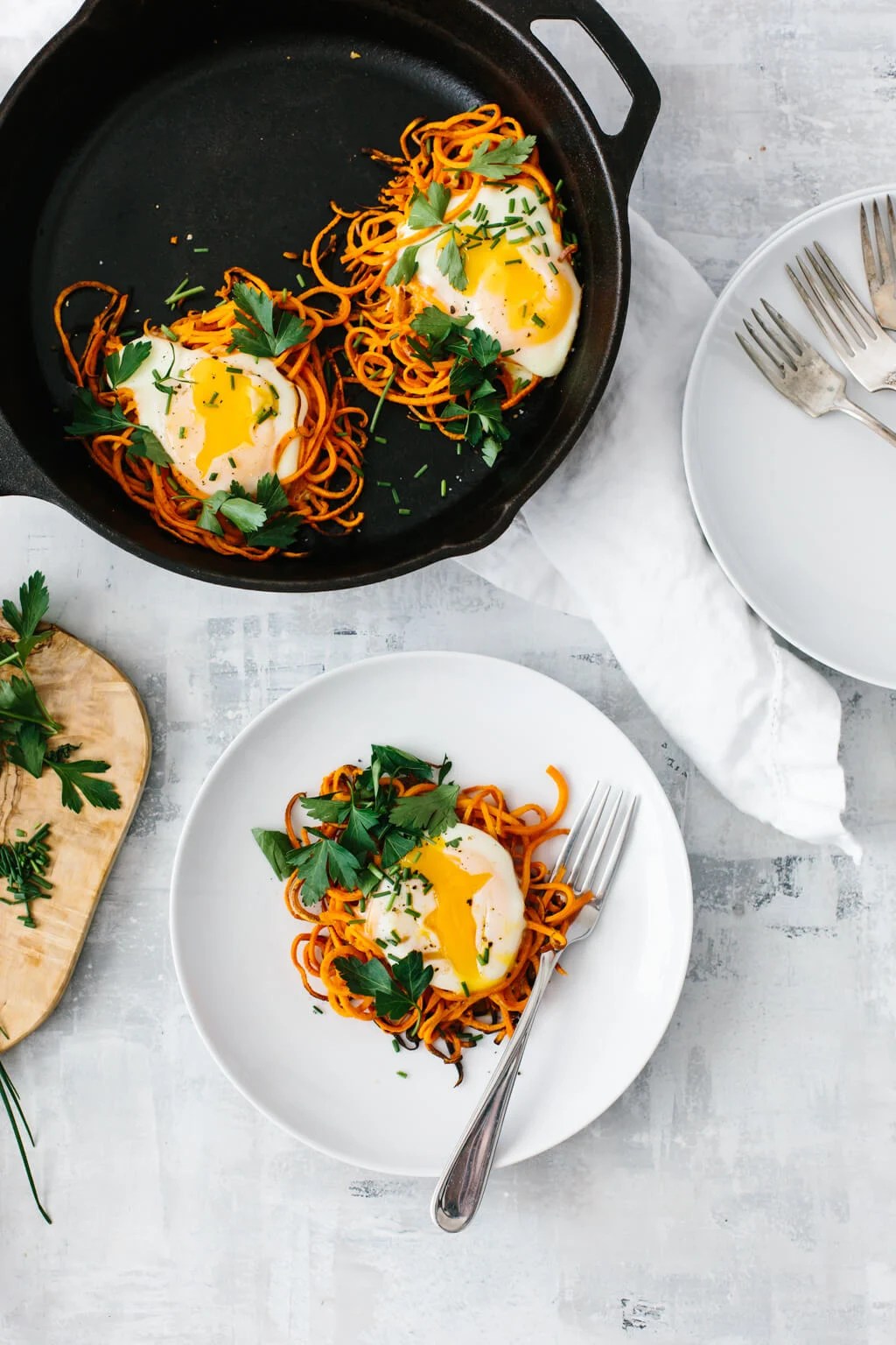 Spiralized sweet potato egg nests are a simple, delicious and healthy breakfast recipe. It's one of my favorite spiralized sweet potato recipes and it's perfect for a weekend breakfast or brunch.
