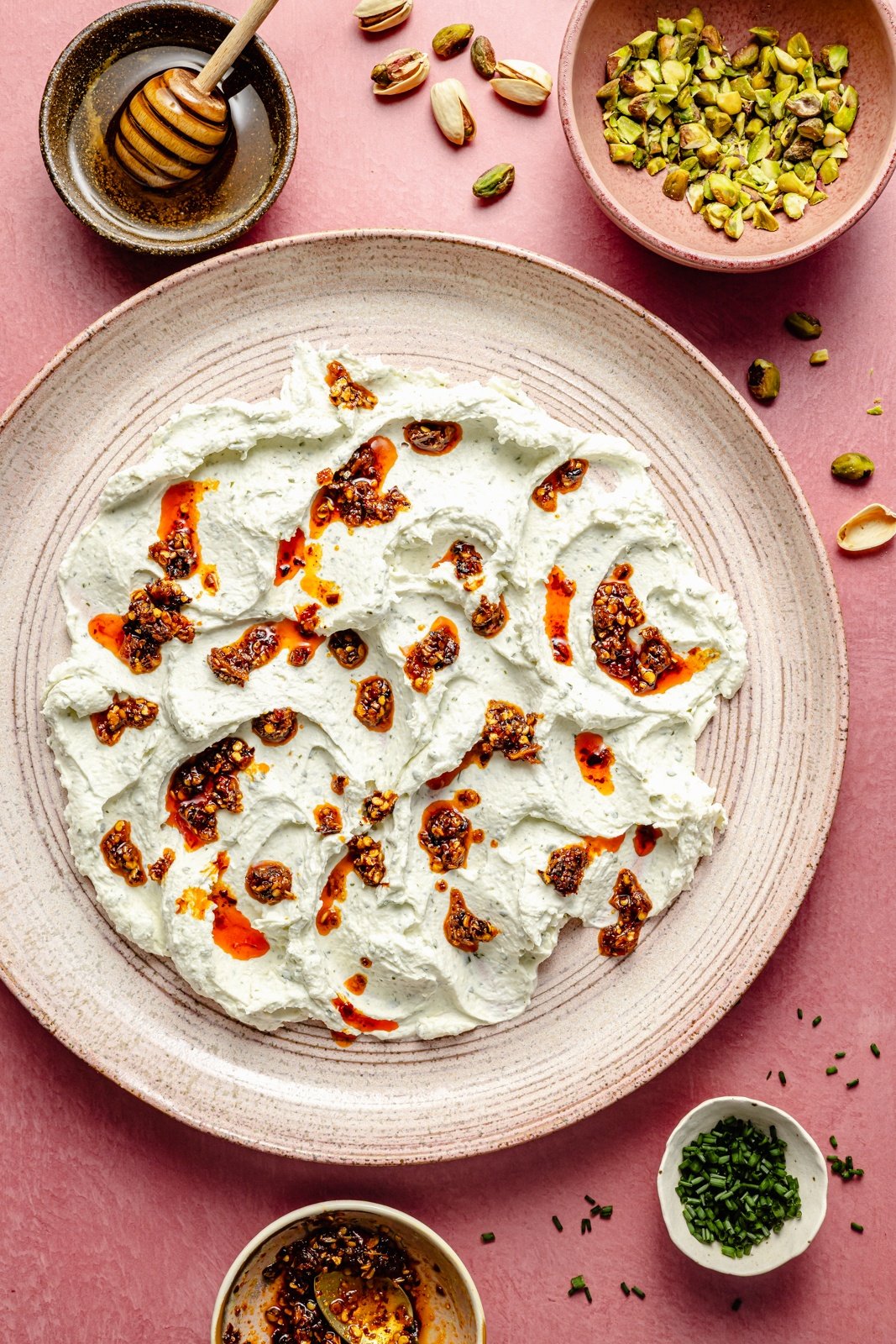 chili crisp cheese dip on a platter