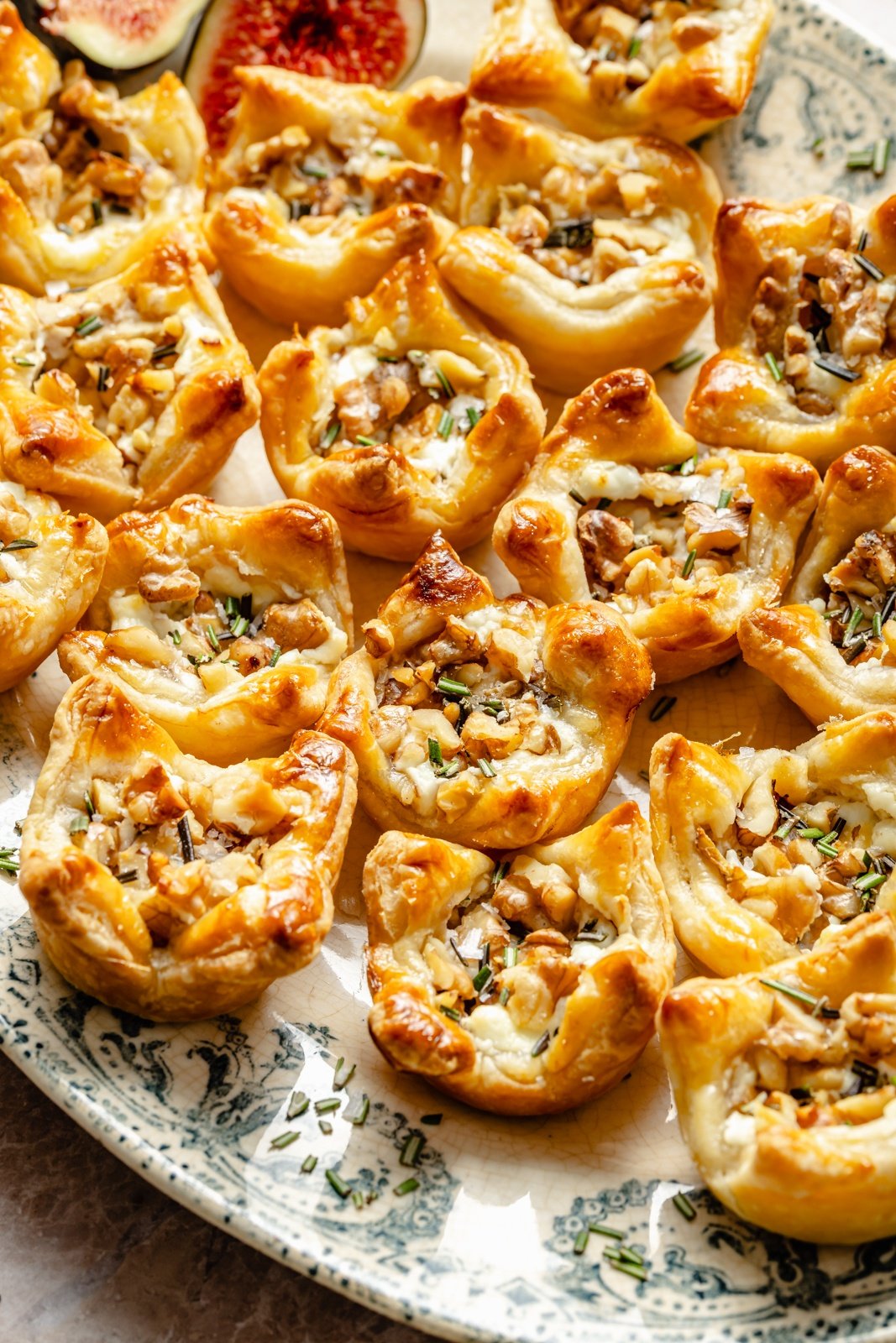 goat cheese puff pastry bites on a platter