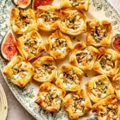 goat cheese puff pastry bites on a platter