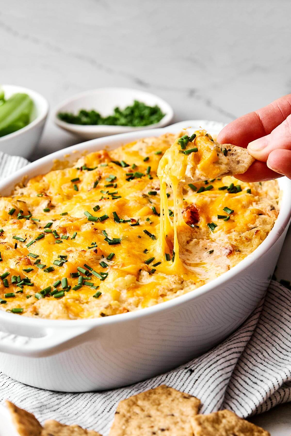 Scooping into a crab dip.