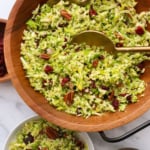 shredded brussel salad in a wooden bowl nearby.