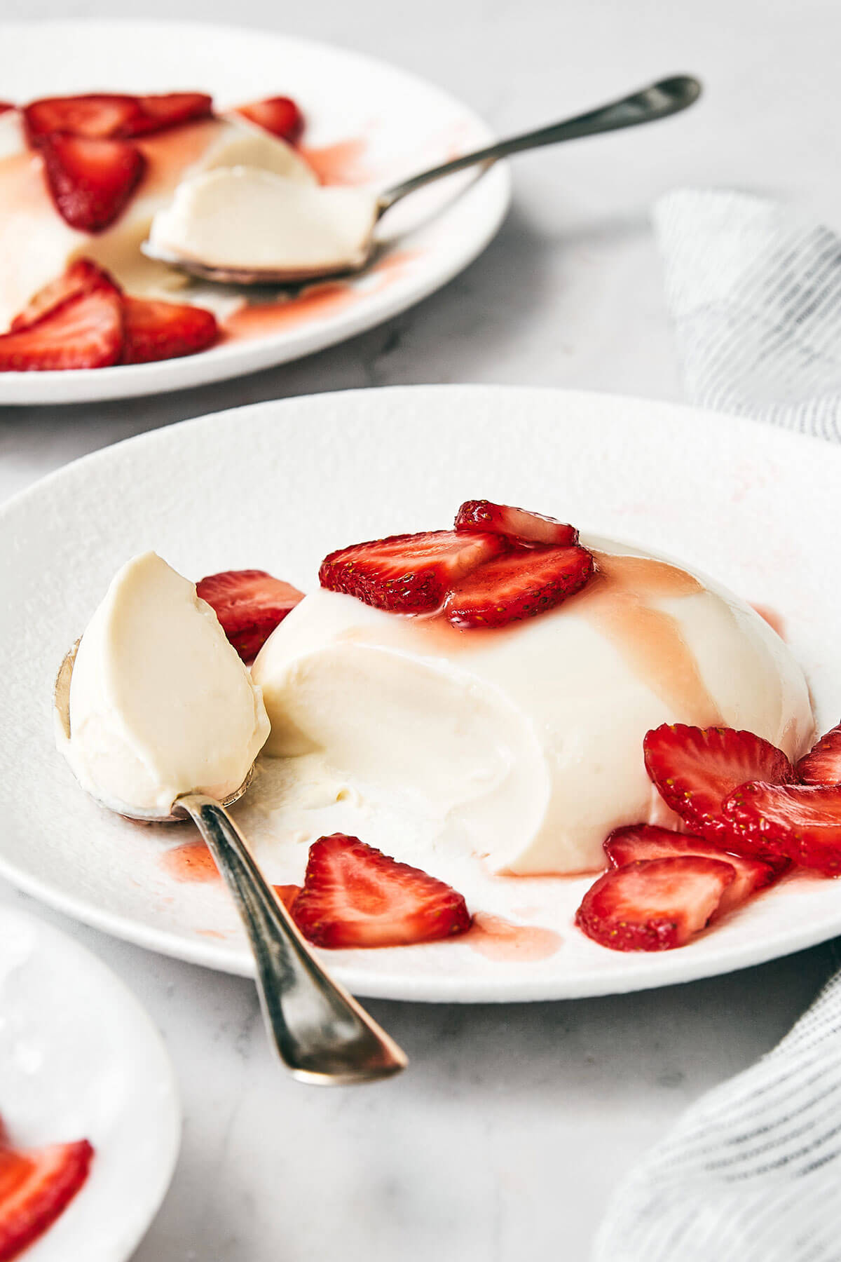 Scooping into a panna cotta