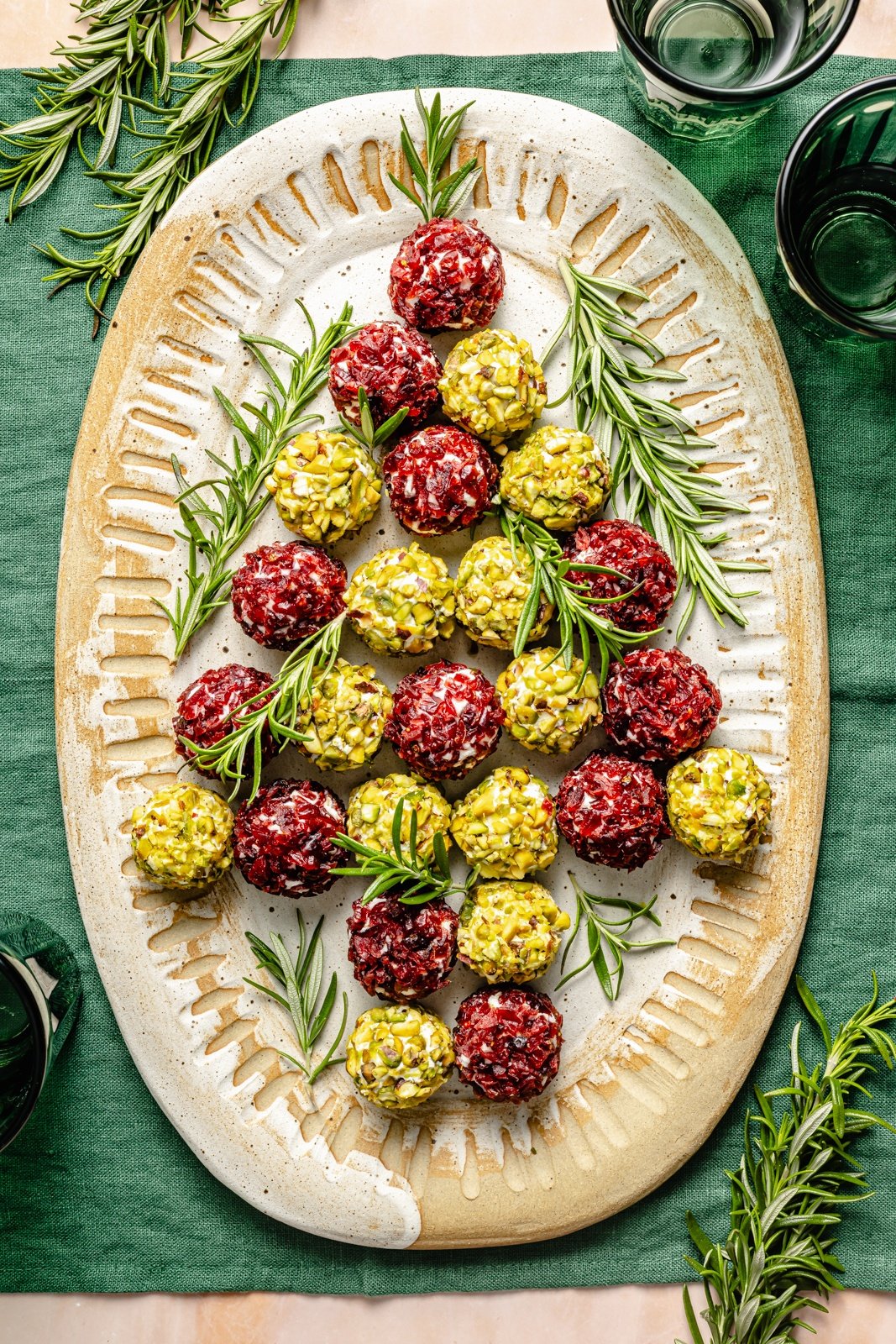 holiday cheese truffles in the shape of a Christmas tree on a platter