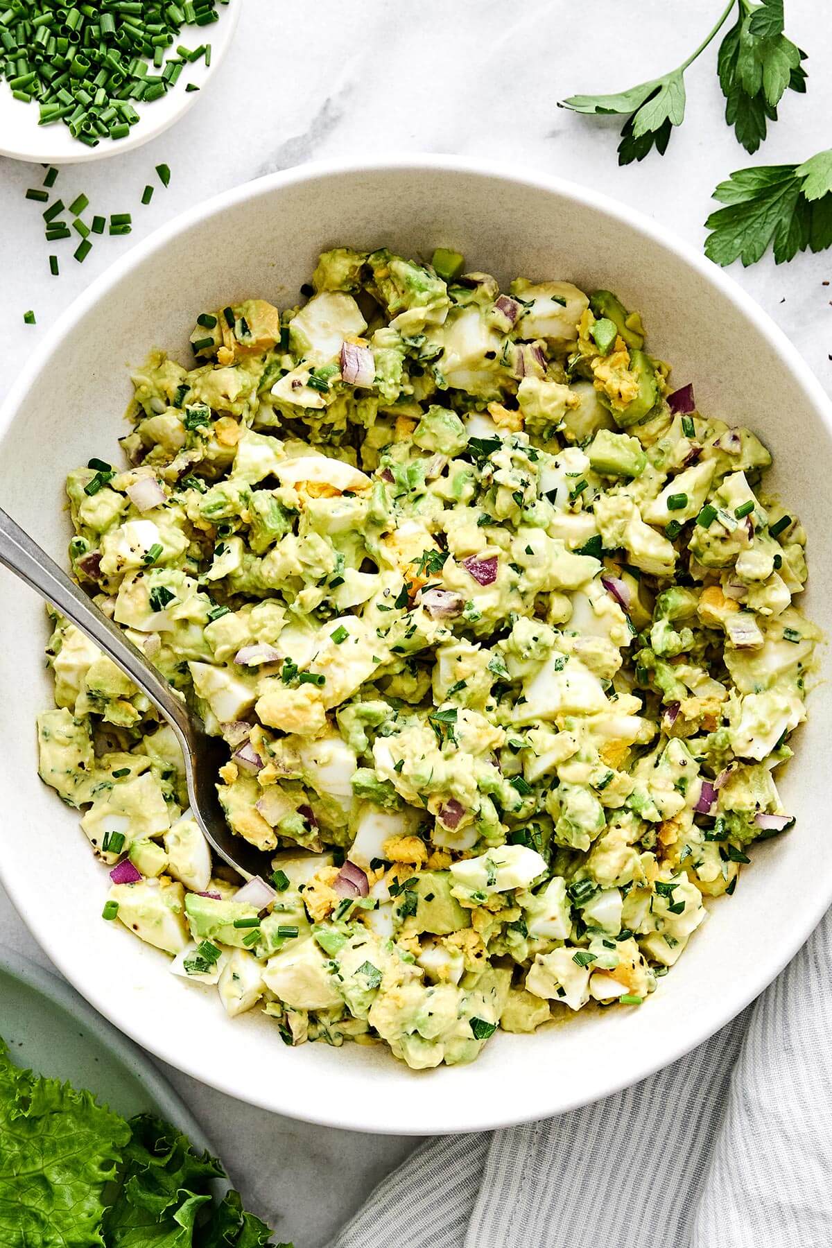 A bowl of avocado egg salad.