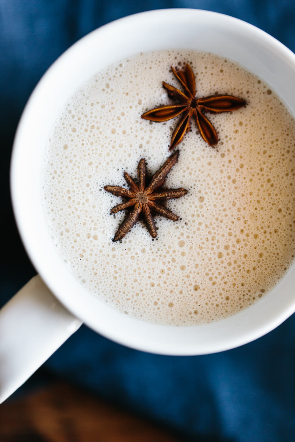 Chai spiced coconut milk made from ginger, turmeric, cinnamon, star anise, vanilla and coconut milk will heat you from the inside out and provide heaps of anti-inflammatory health benefits.