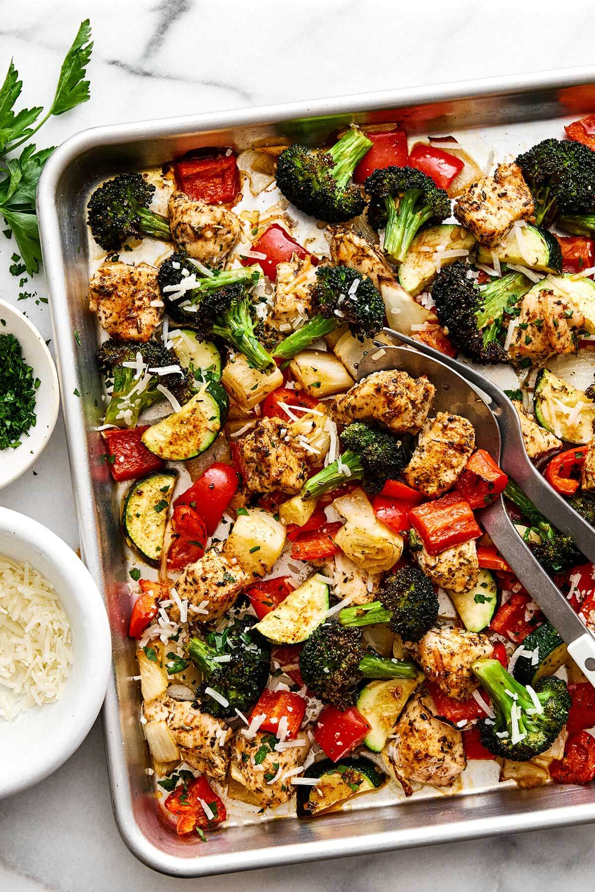 Italian sheet pan dinner with chicken breast and vegetables.
