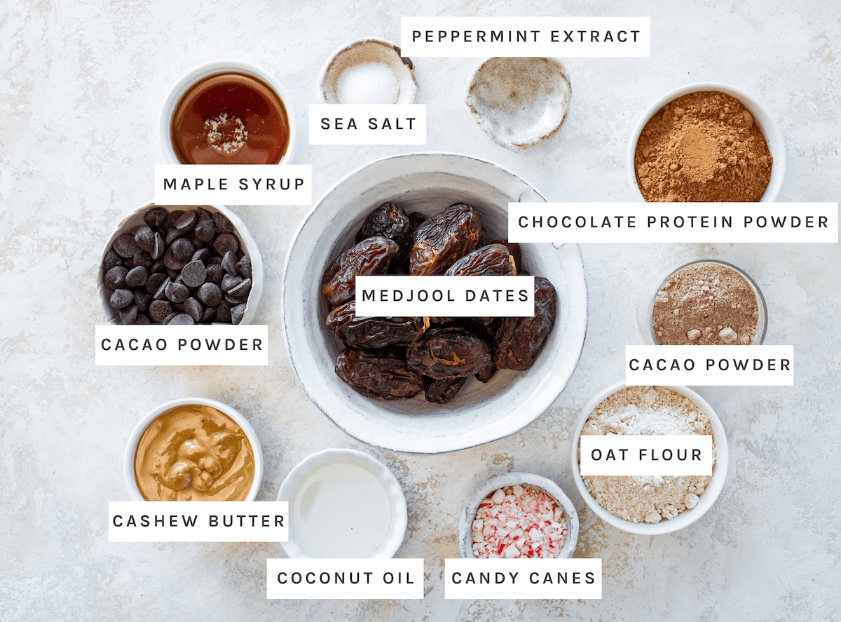 Maple syrup, sea salt, peppermint extract, chocolate protein powder, cacao powder, oat flour, candy canes, coconut oil, cashew butter, chocolate chips, Medjool dates