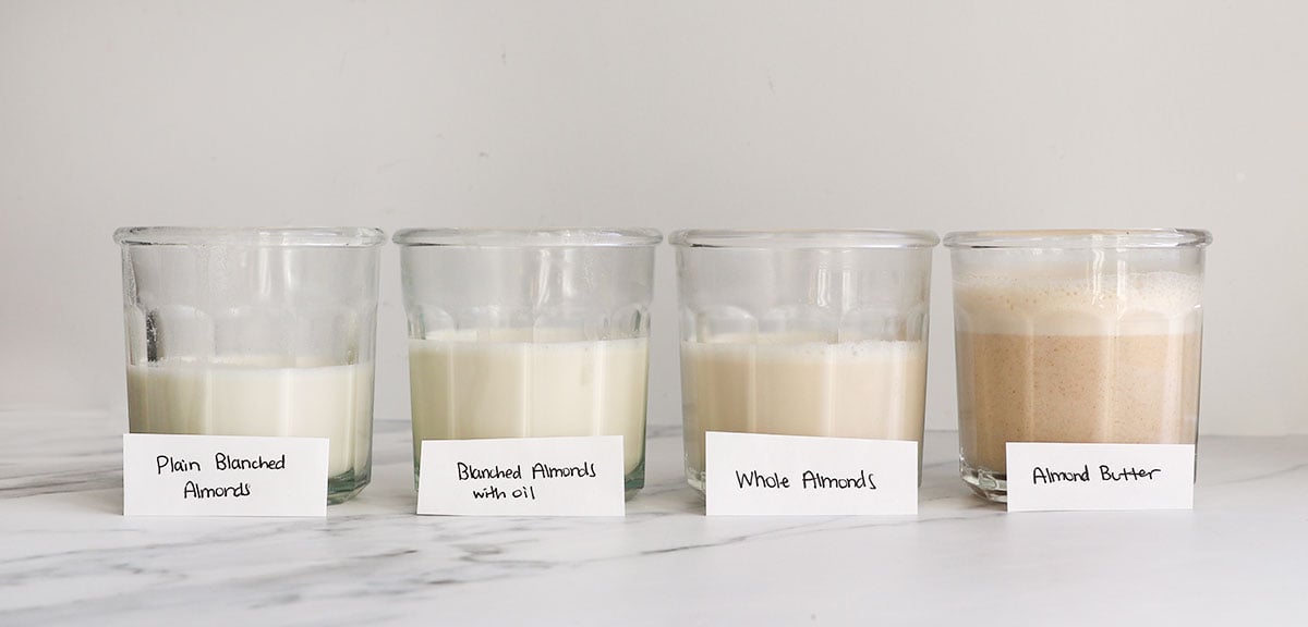 4 jars of dairy free creamer experiments labeled by ingredients.