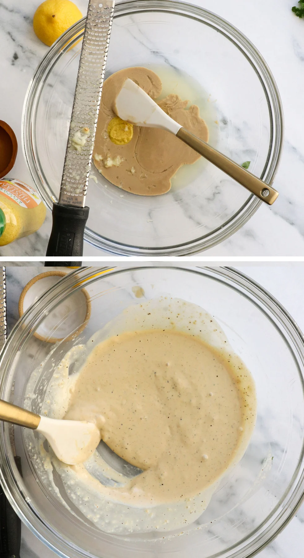tahini caesar dressing stirred in a glass bowl.