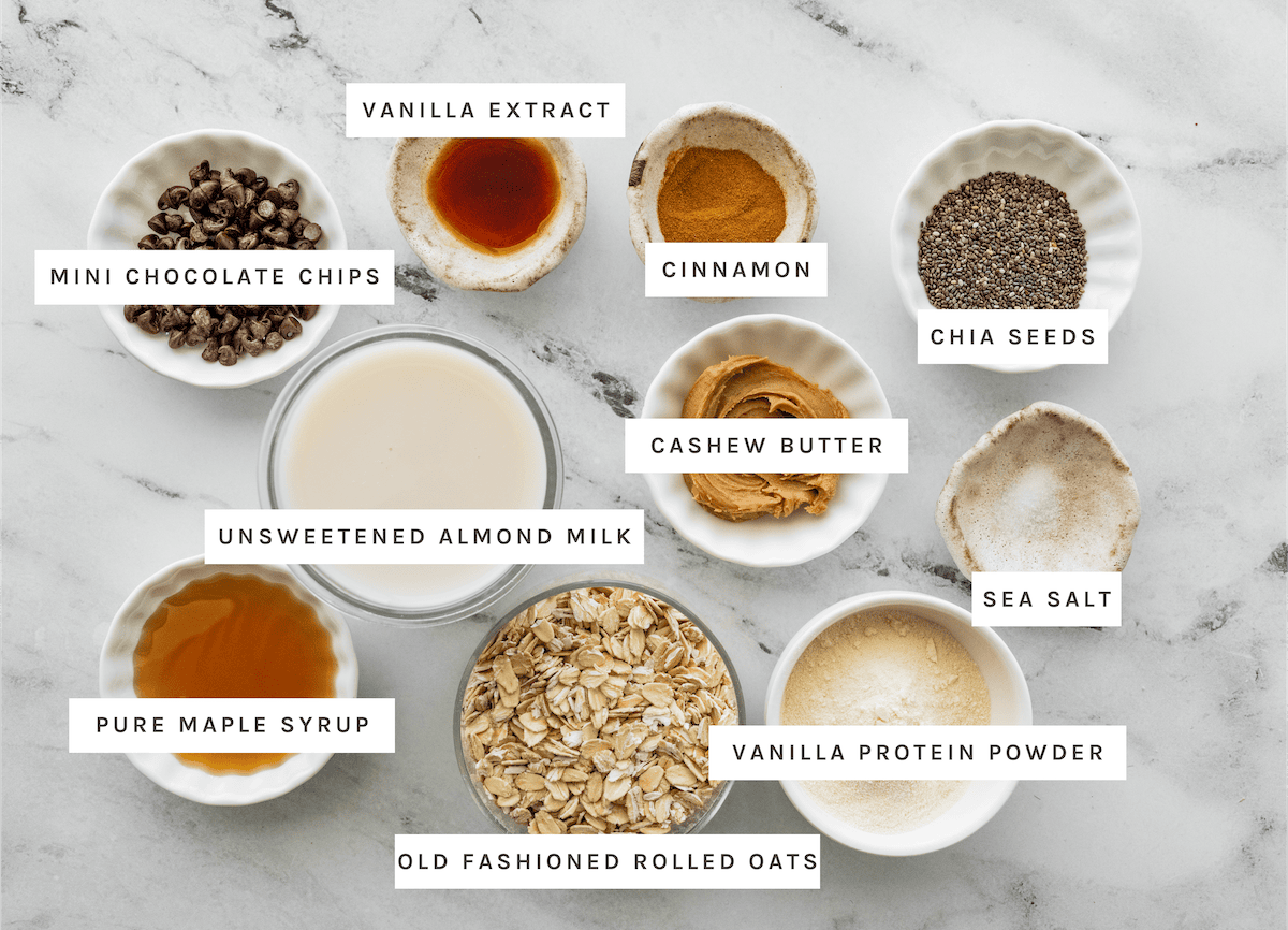 Vanilla extract, mini chocolate chips, cinnamon, chia seeds, unsweetened almond milk, cashew butter, sea salt, pure maple syrup, old fashioned rolled oats, vanilla protein powder