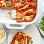 vegan lasagna in a casserole dish and slice served on a plate.