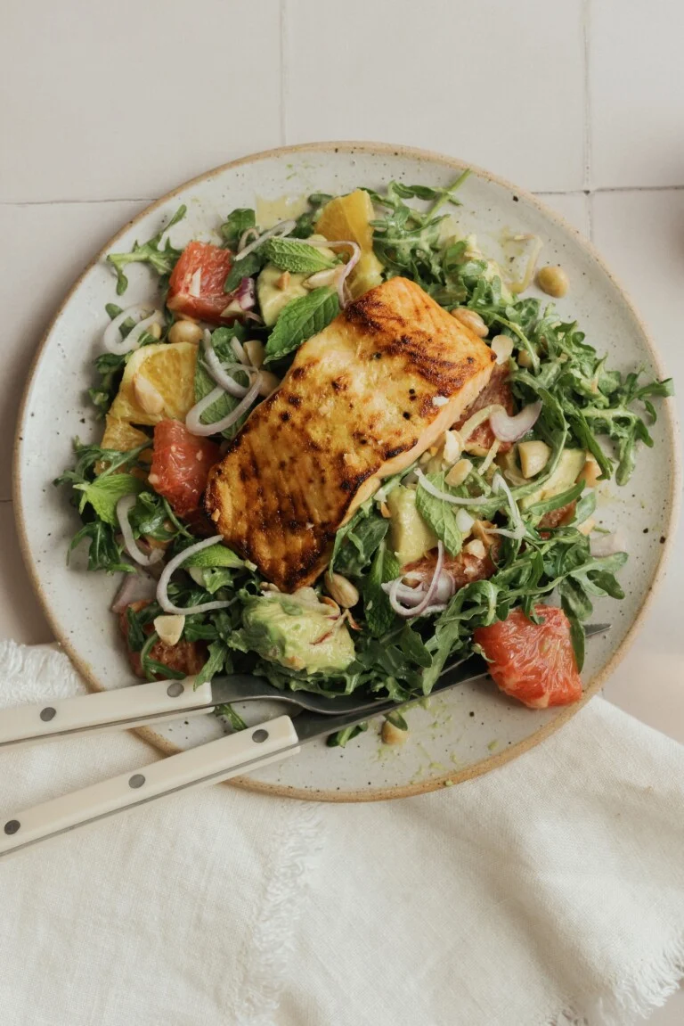 citrus salmon salad with avocado, yellow shirt