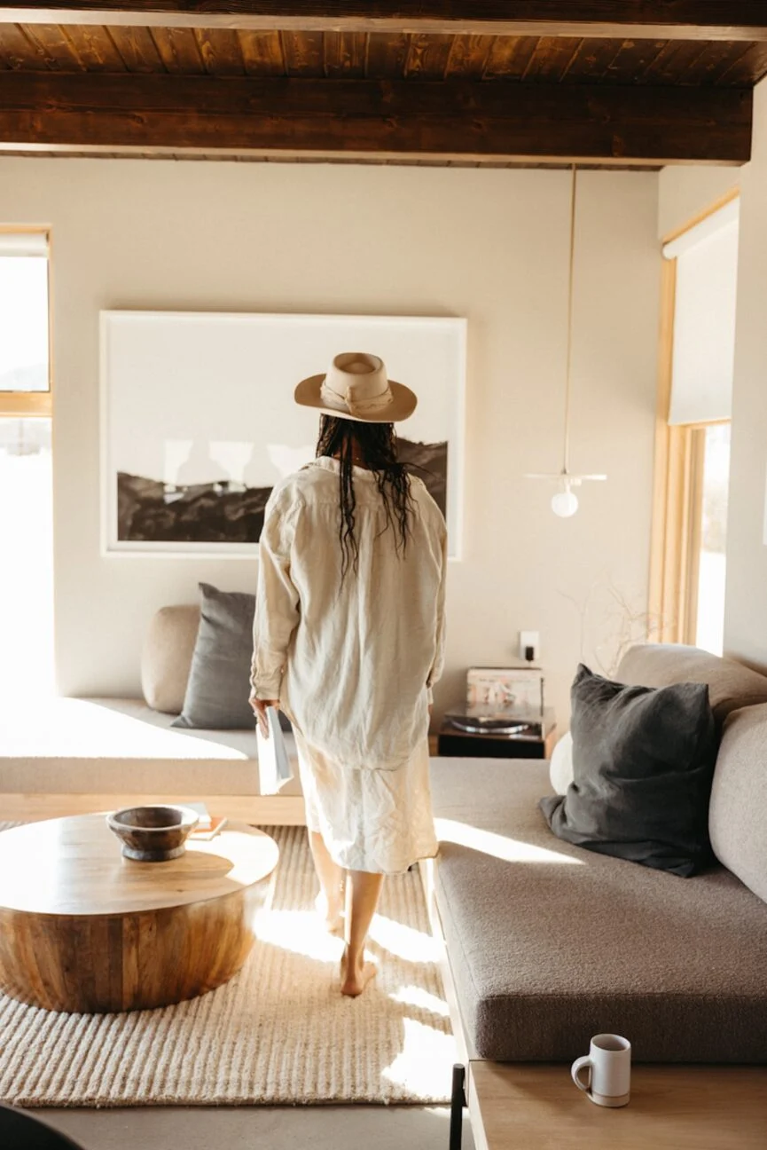 Woman walking in living room